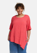 Túnica 'Crissa' – plissada, leve e moderna-assimétrica